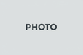 Generate an image placeholder with the word PHOTO